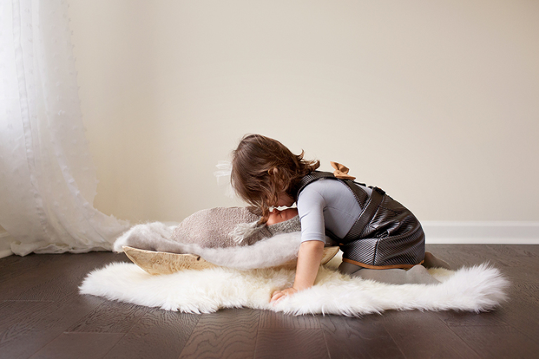 Little girl with newborn brother